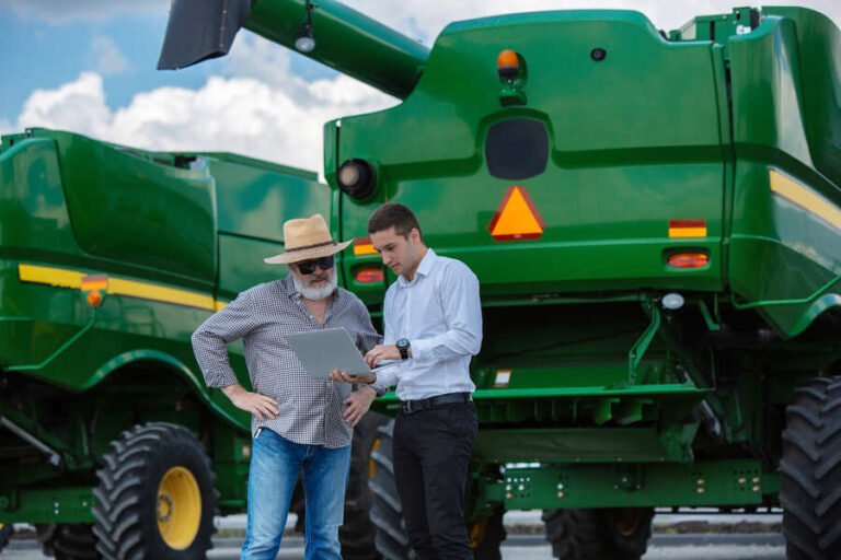 businessman-farmer-with-tractors